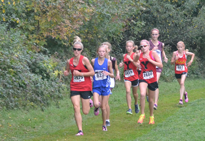 Maggie Klemm, Olivia Borowiak, and Colleen O'Connor in the Varsity Girls Race of the Fox Trot Invite